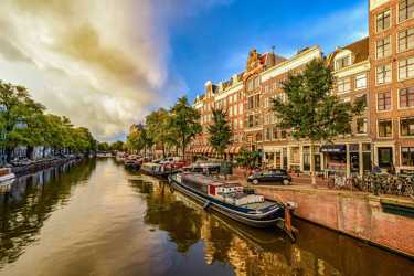 Enafors til Amsterdam tog, fly billige billetter og priser